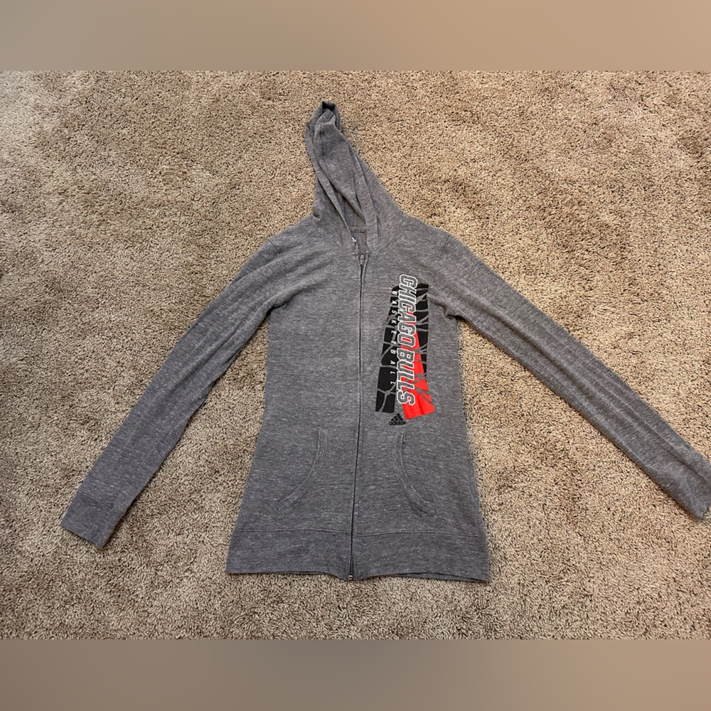 Woman’s Chicago Bulls Basketball zip up adidas hoodie.